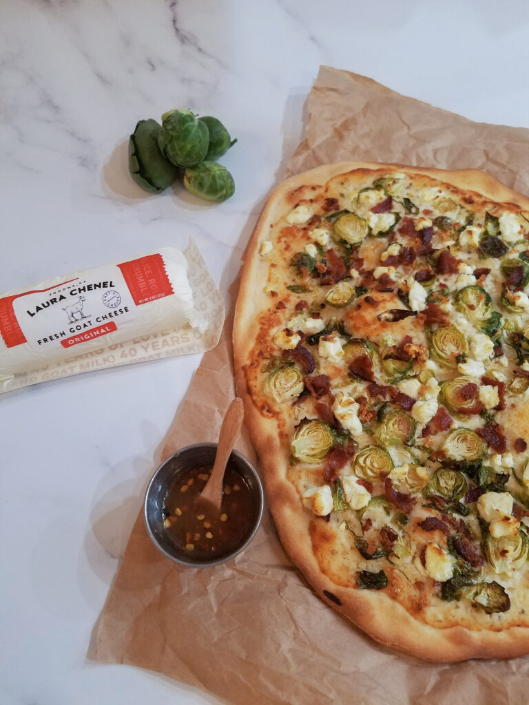 a prepared Bacon Brussel Sprout Goat Cheese Pizza