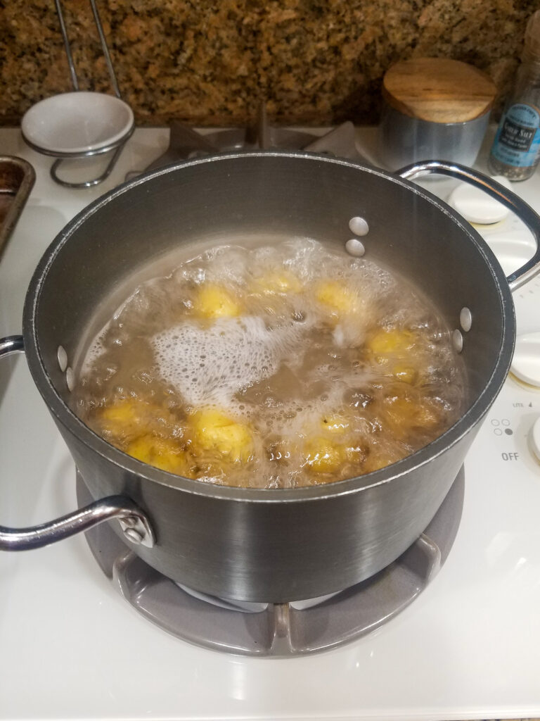 Boiling the potatoes.
