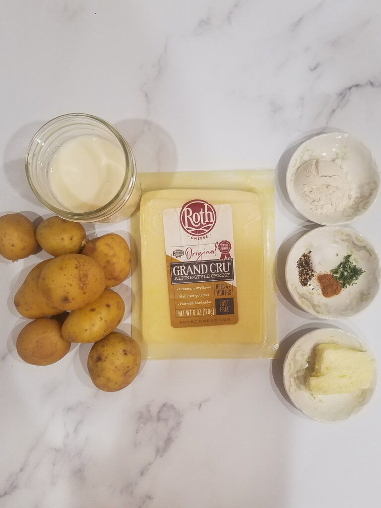 Ingredients needed to make crispy smashed potatoes with grand cru cheese sauce.