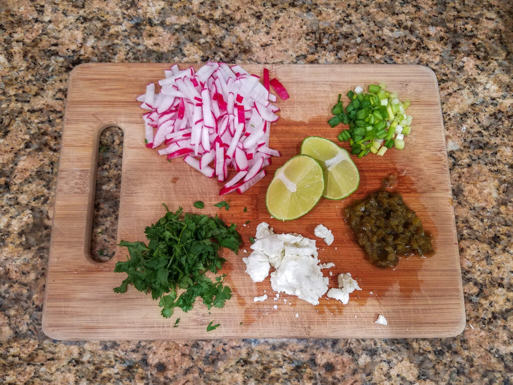 Prepped ingredients for the spicy goat cheese radish slaw. 