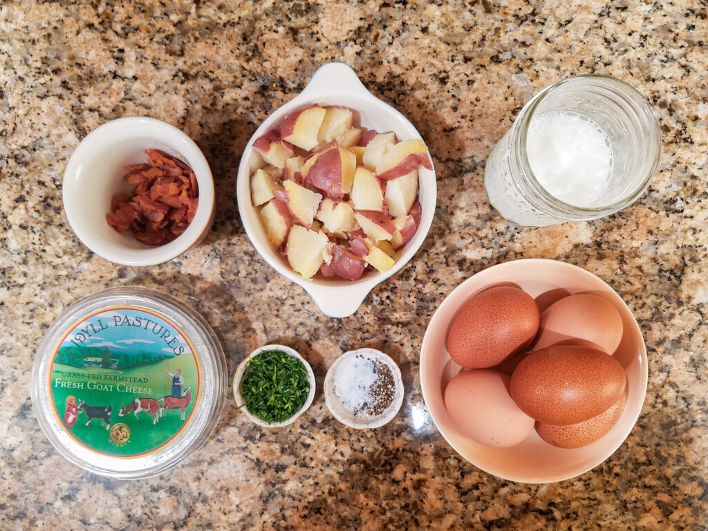 All of teh ingredients needed to make teh loaded potato quiche.