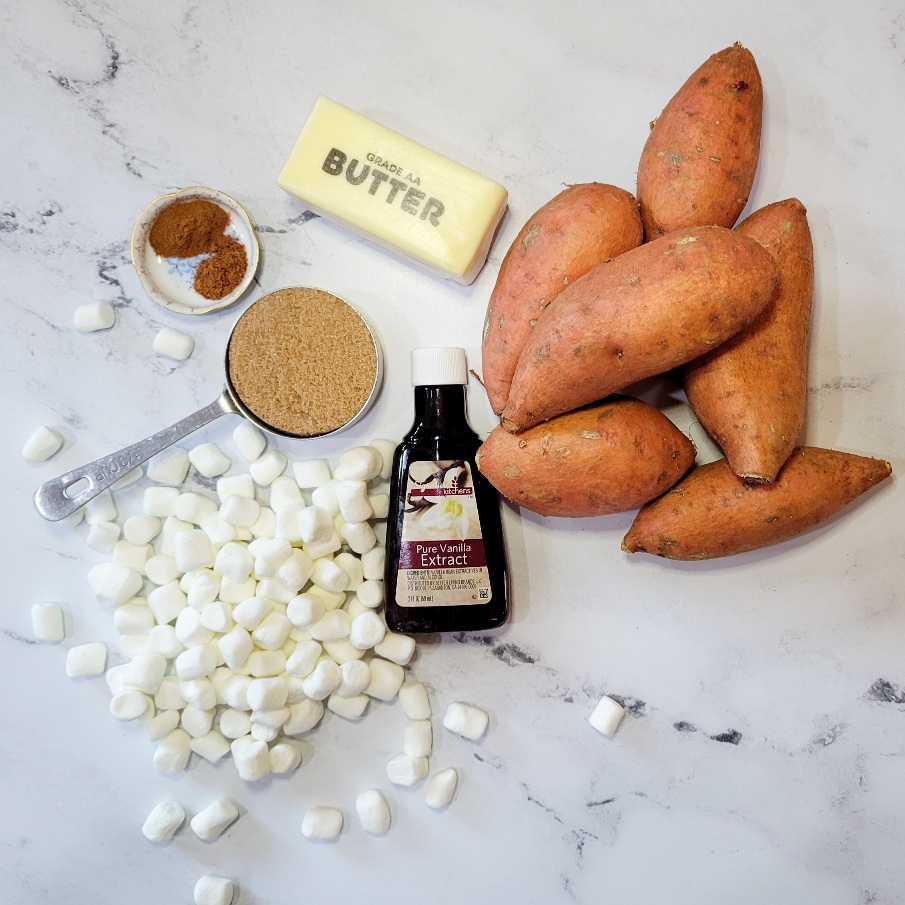 All of the ingredients needed to make the candied hasselback sweet potatoes. 