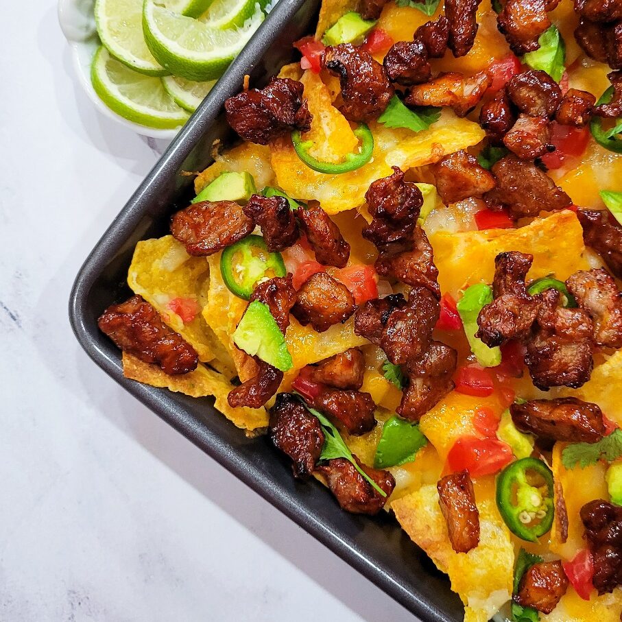 A finished pan of the air fryer pork burnt end nachos